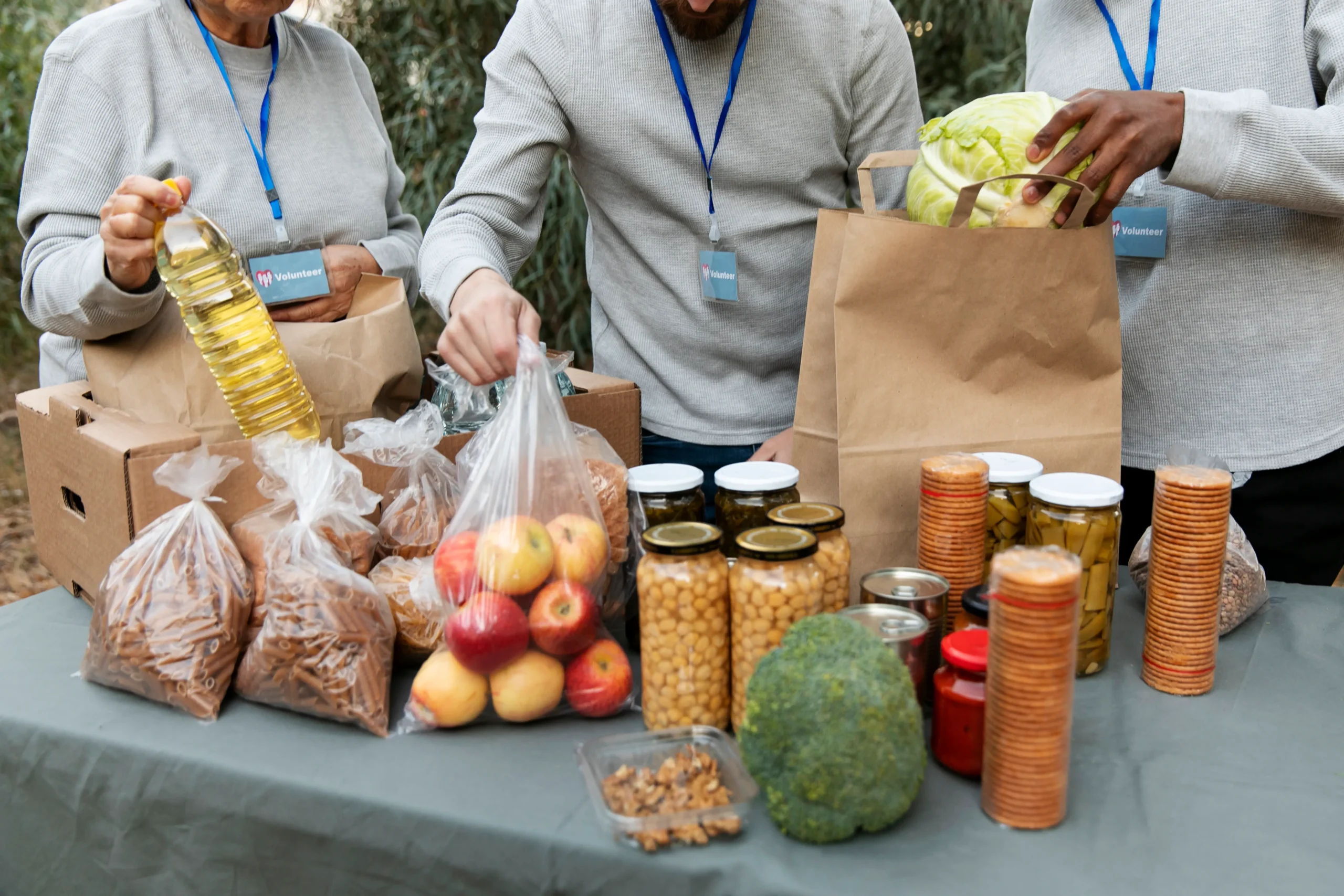 close-up-volunteers-working-together_11zon Close Up Volunteers Working Together 11zon Scaled 1